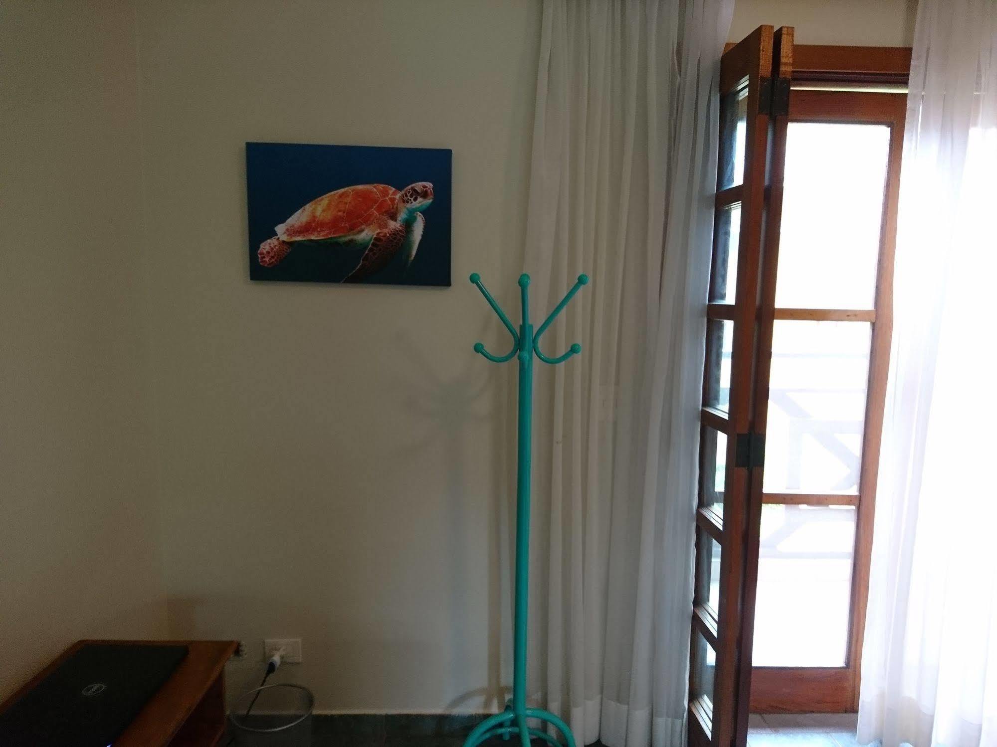 Galapagos Aparthotel Ilhabela Bagian luar foto